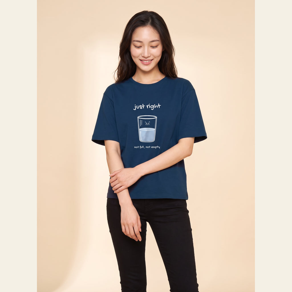 The Just Right T-Shirt – Adult in Navy Blue, worn by an adult, with the small Just Right mark on the chest