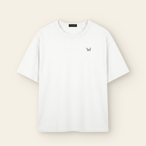 The Batce T-Shirt - Adult in White with the hand-drawn Batce mark and woven brand label.