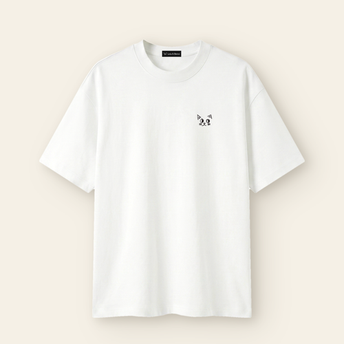 The Batce T-Shirt - Kids in White with the hand-drawn Batce mark and woven brand label.