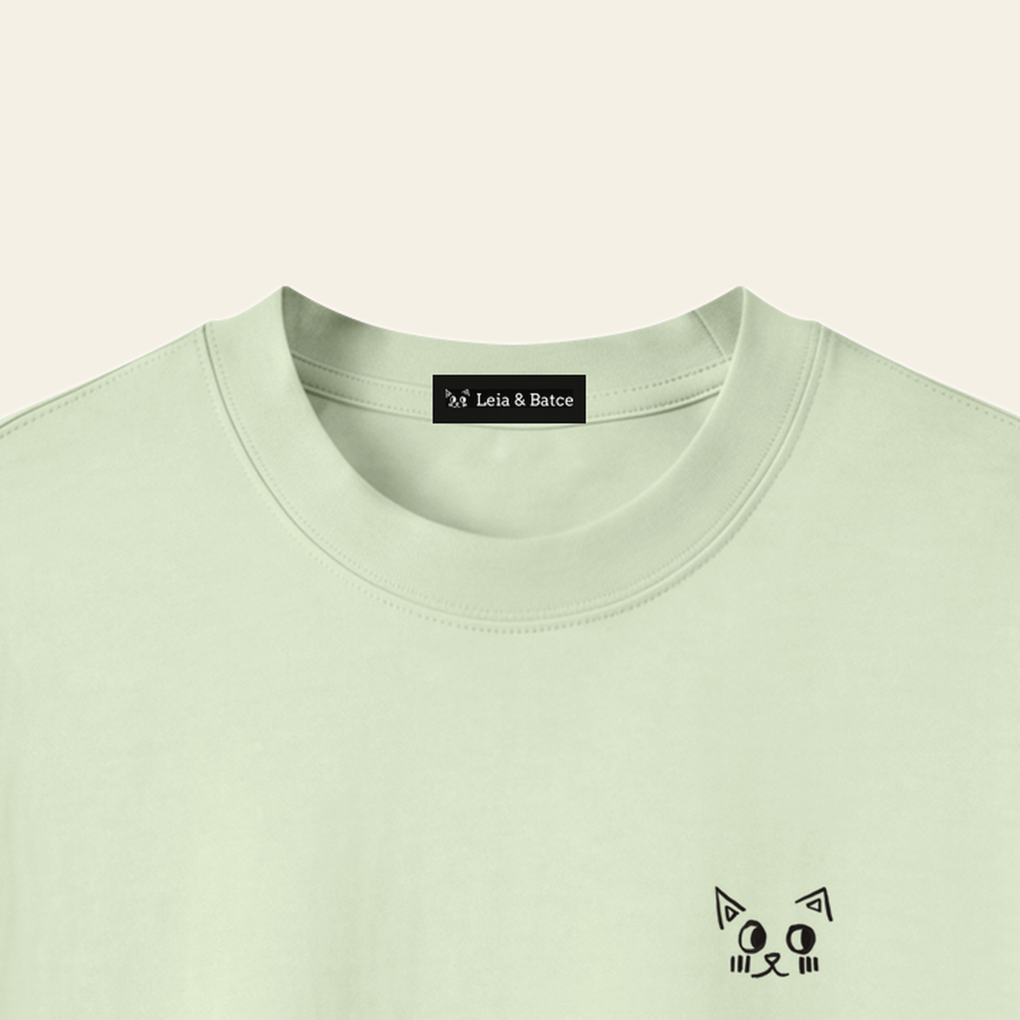 The Leia & Batce woven label inside the collar of the kids tee.