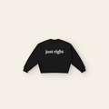 Just Right Lettering Wave Boxy Fleece Sweatshirt – Adult in Black, laid flat