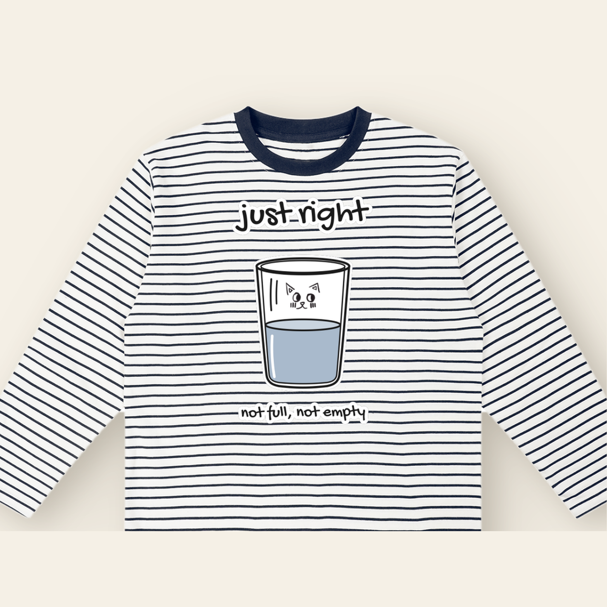 Close-up of the Just Right mark printed on the White / Black long-sleeve t-shirt
