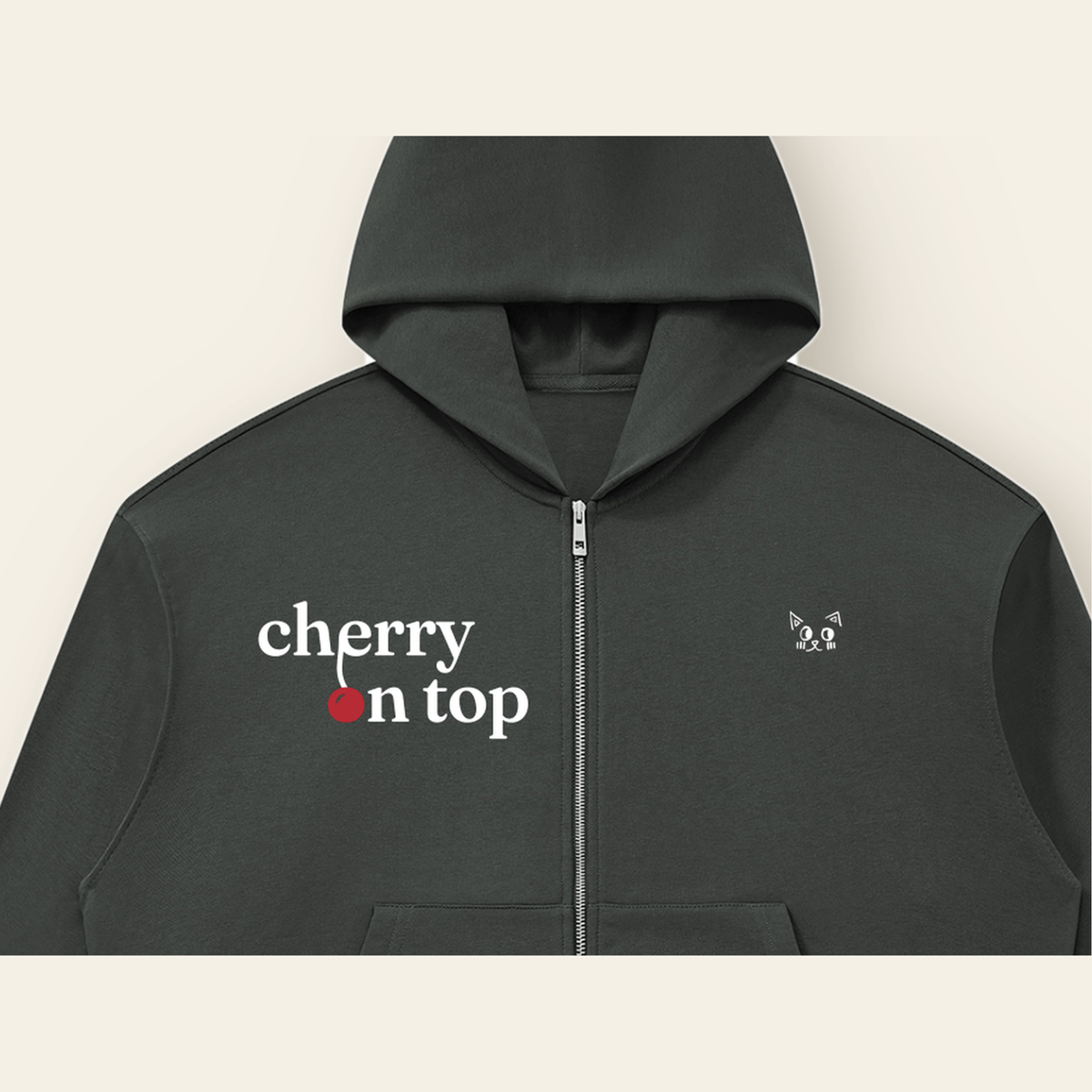 Close-up of the Cherry on Top mark printed on the Dark Gray zip hoodie